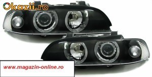 Vand Faruri BMW E39 seria 5 cu lupa si angel eyes fundal negru foto mare