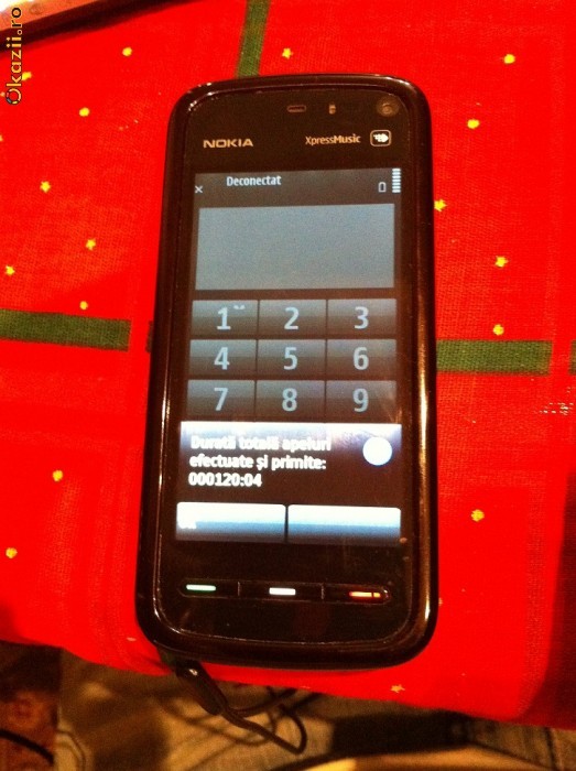 Vand Nokia 5800 xm, bonus suport si incarcator auto originale !!! foto mare
